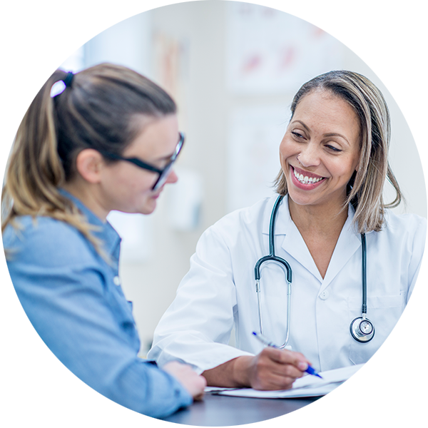 doctor-and-patient-istockphoto-1000940800-612x612_purchased-v5 Two women, doctor and patient, reviewing paperwork